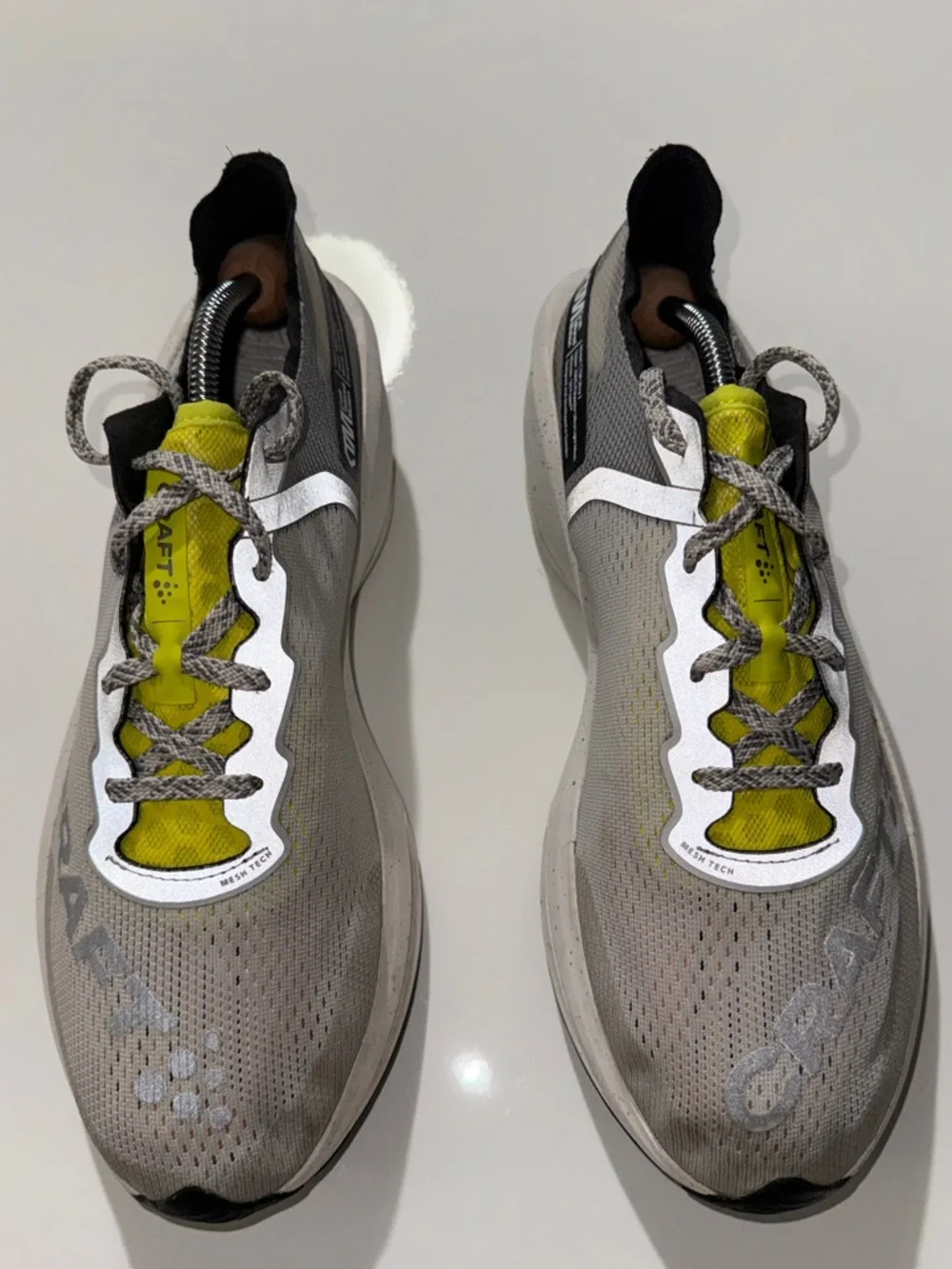 Craft Lightweight Neutral Gray Running Shoes with Bright Yellow Accents